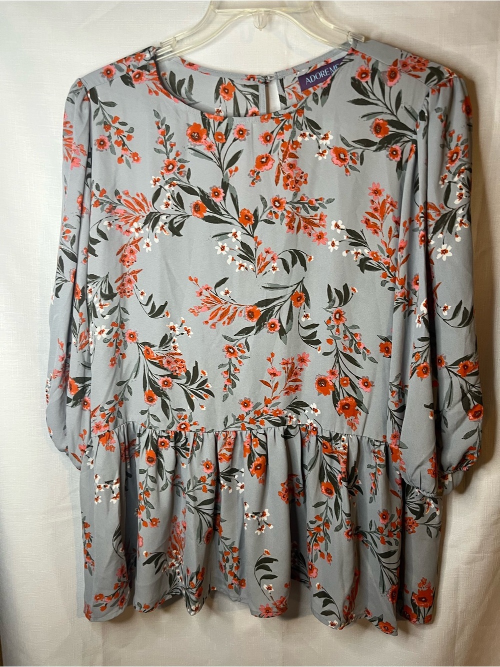 Adore Me Blue Floral Peplum Top with Orange Blooms